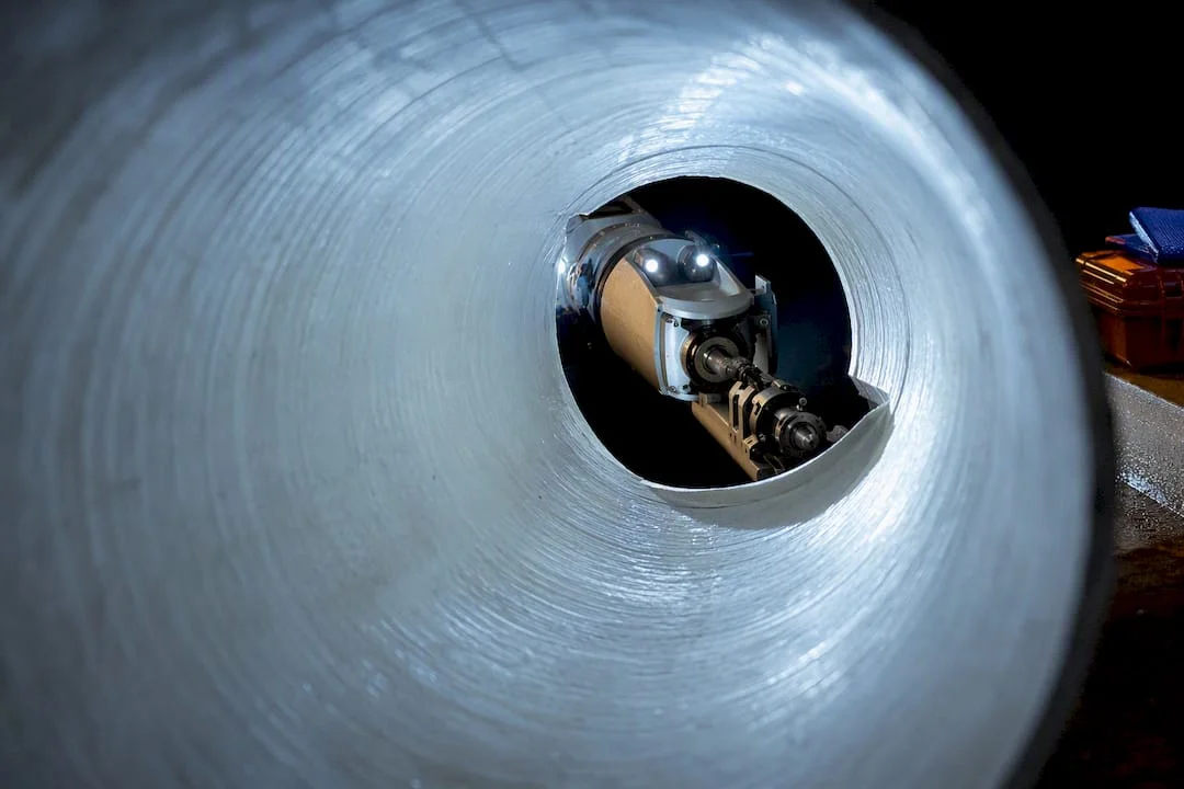 Robotic cutter opening a sewer lateral